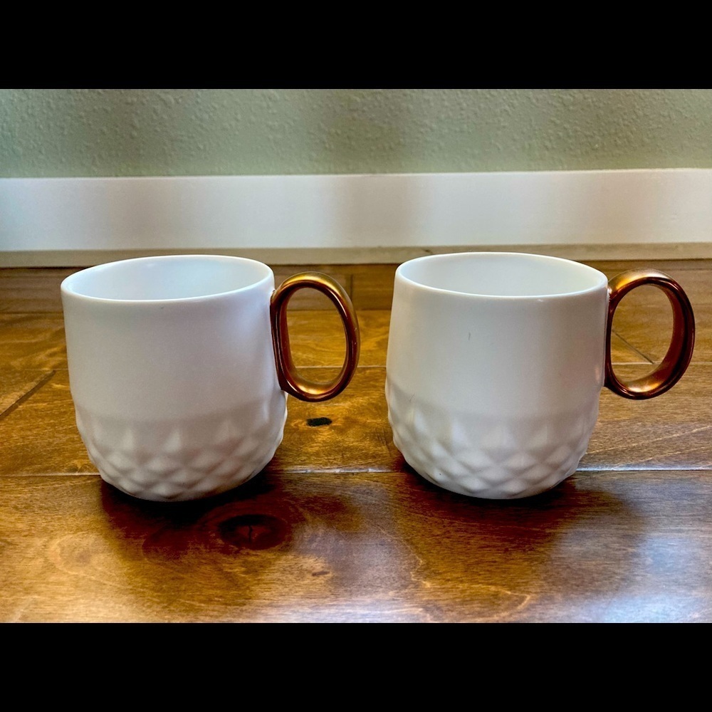 STARBUCKS Pair of (2) White Geometric 12 Oz Bronze Colored Handle Coffee Mugs